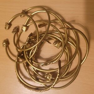 Brass Bracelets. Nefertti and Elephants At The Ends. Bendable. Set Of 12.